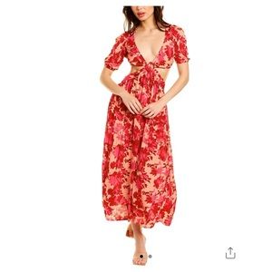 Beautiful cut out, open back floral midi dress.